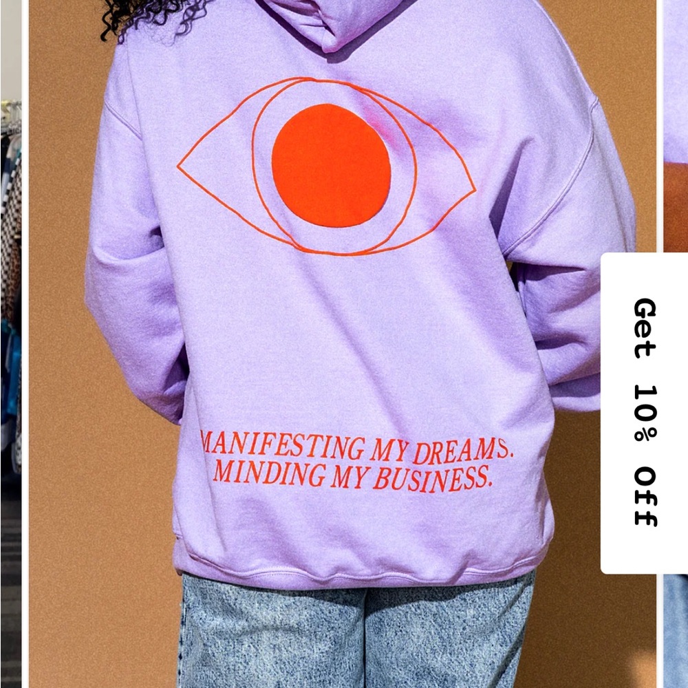 Dressed in LALA Purple Hoodie with Orange Graphic